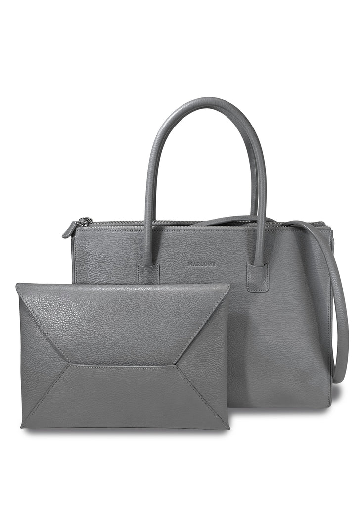 leather double zipper bag with shoulder strap and open galleria pebble calfskin leather shown with coordinating envelope clutch