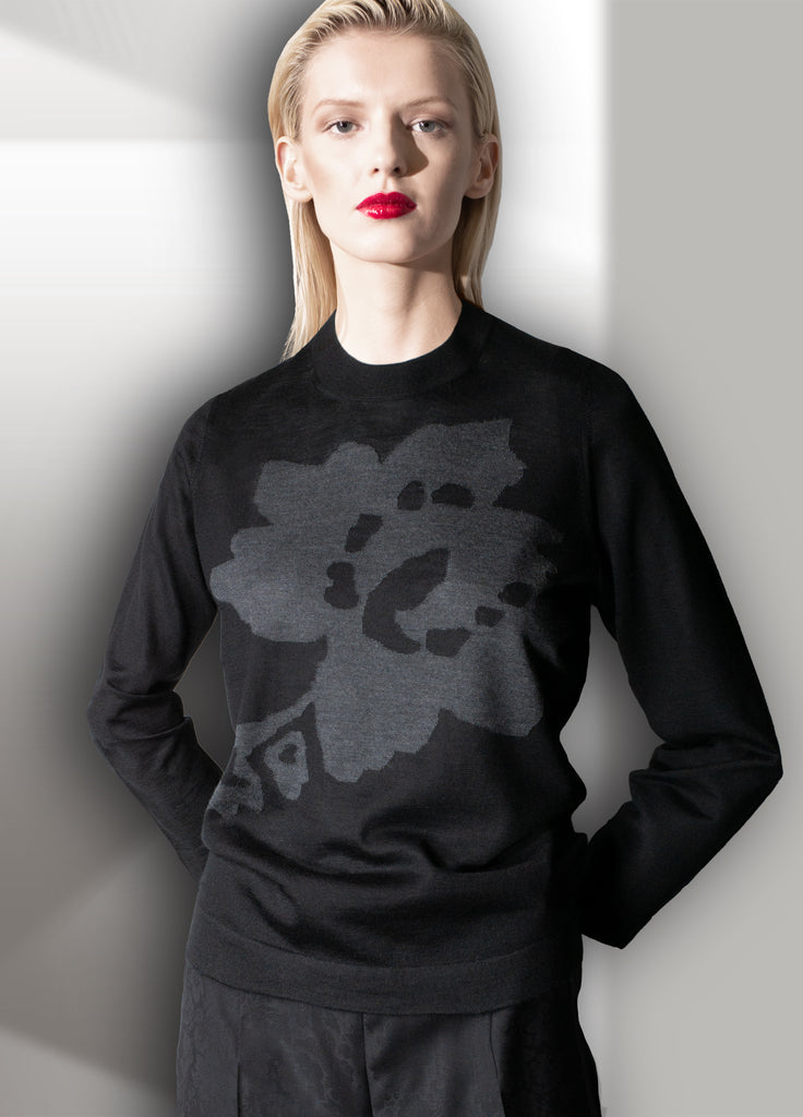 cashmere second skin crew neck sweater with abstract floral flower black with graphite grey flower on model