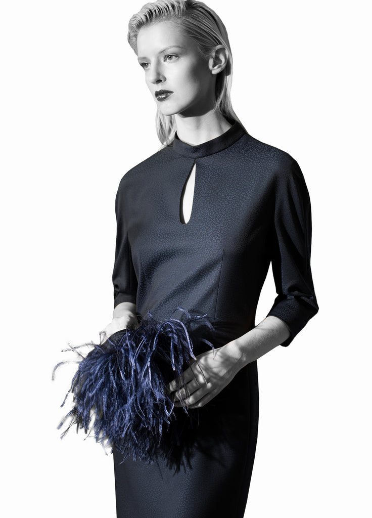 Women's navy dress with detachable feather cuffs