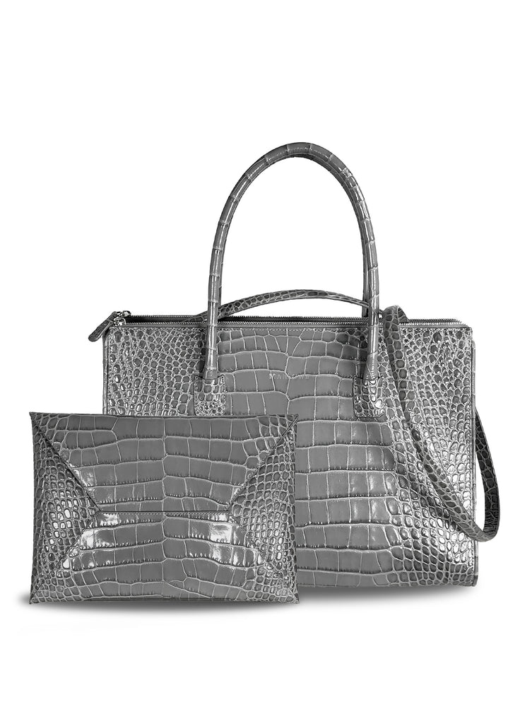 Leather tote bag with double zipper compartments and open galleria grey croc with matching envelope clutch